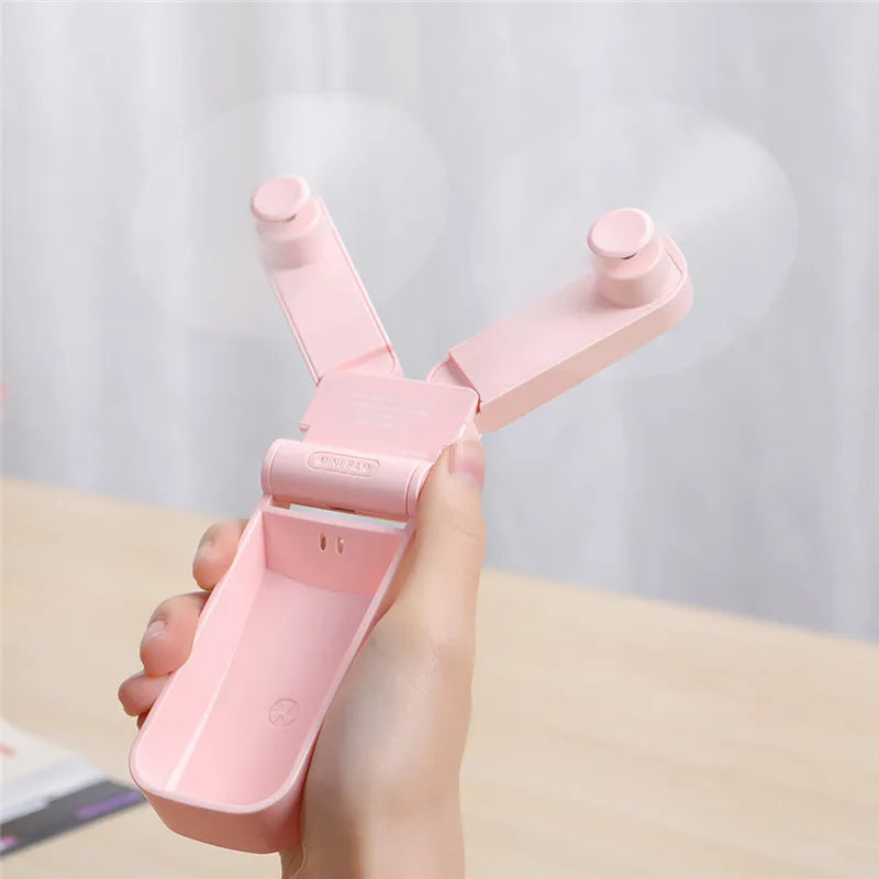 BreezeBlade Foldable Dual Fan – Compact, USB Rechargeable & Pocket-Ready