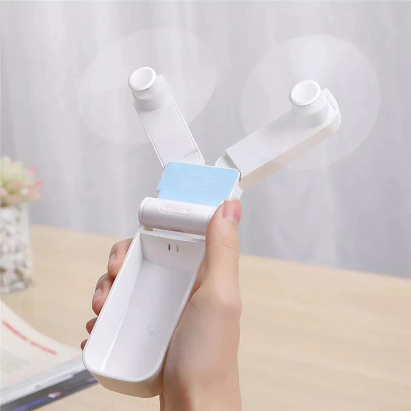BreezeBlade Foldable Dual Fan – Compact, USB Rechargeable & Pocket-Ready
